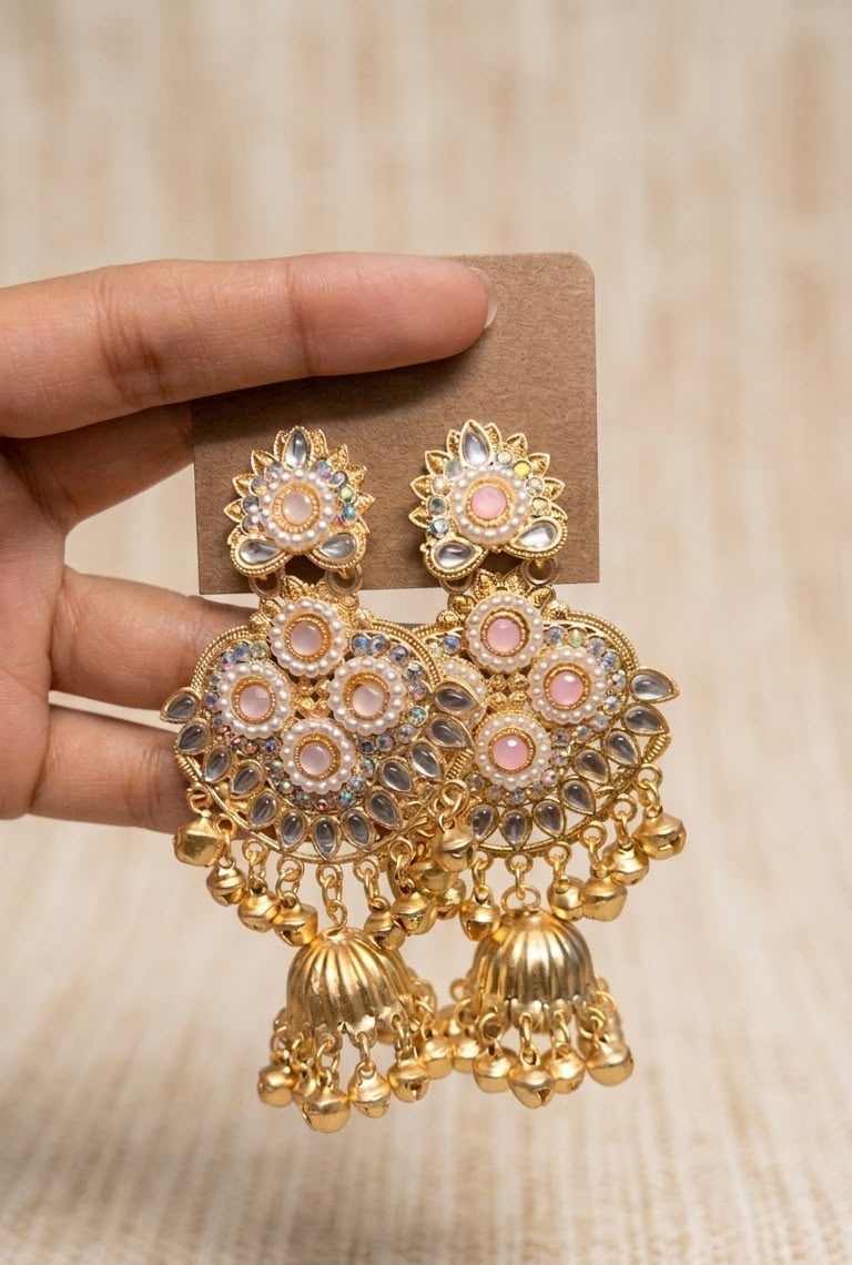 Traditional Gold-Plated Kundan Jhumkas with Emerald Stones, Pearls, and Hanging Ghungroos
